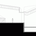 Centro de Alto Rendimento de Remo do Pocinho / Álvaro Fernandes Andrade Centro de Alto Rendimento de Remo do Pocinho / Álvaro Fernandes Andrade Corte Transversal del Área de Entrenamiento