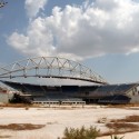 El estadio no tiene quien lo visite El estadio no tiene quien lo visite Estadio olímpico de vóleibol de playa en Atenas en 2012. Image © Vía Business Insider